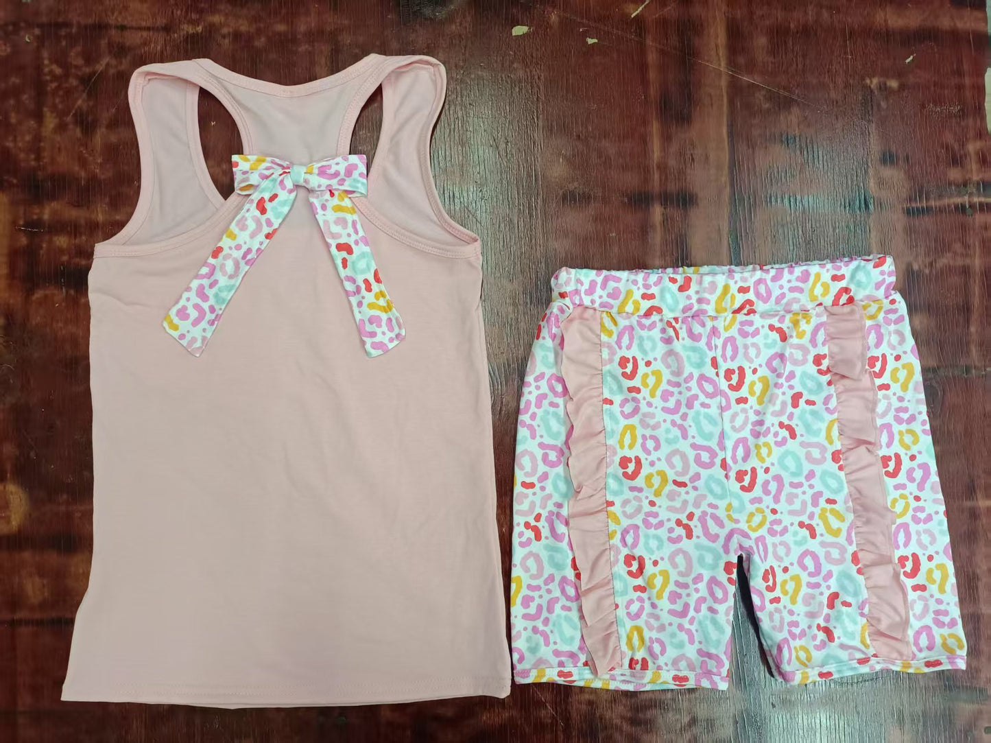 Preorder moq 5 Baby Girls Peach Sleeveless Bows Pocket Vest Colorful Leopard Ruffle Short Set