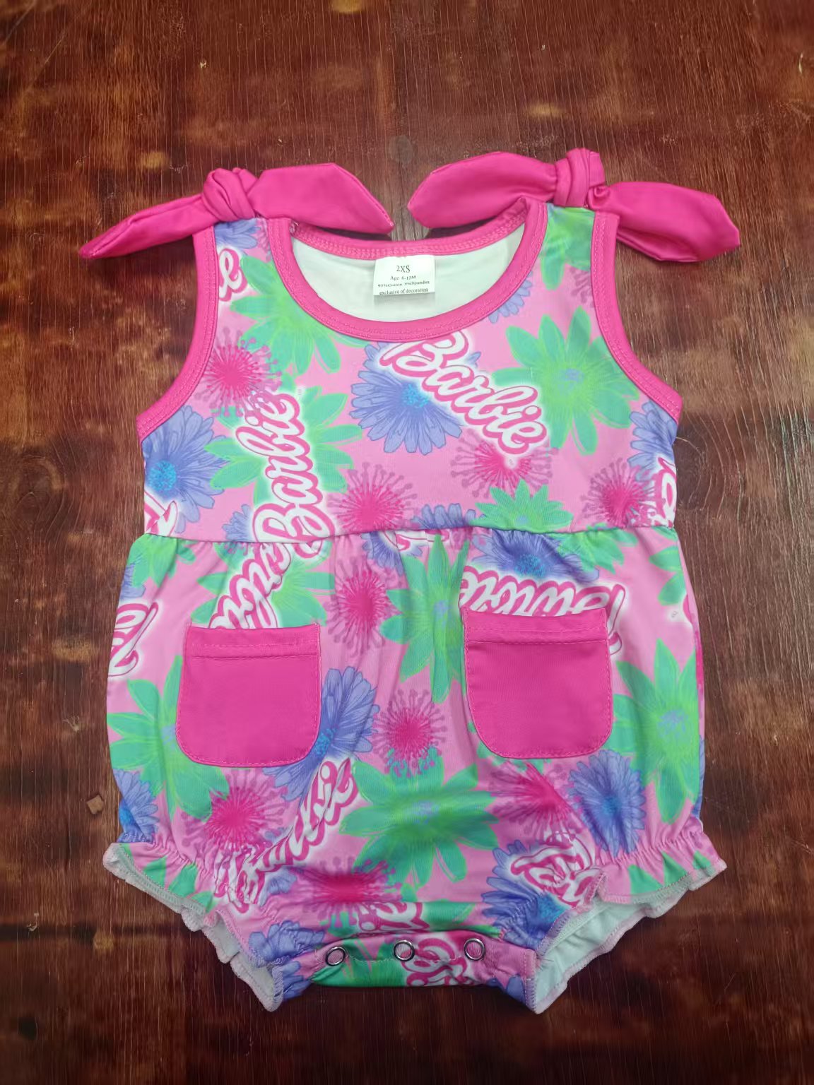 Preorder moq 5 Baby Girls Pink Strap Cartoon Dolls Flowers Pockets Ruffle Rompers