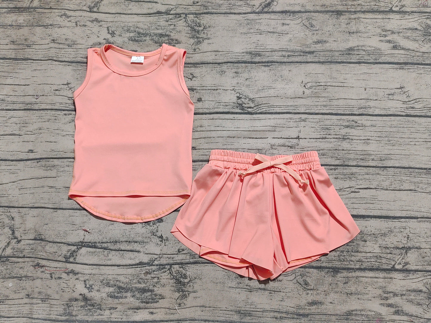 Baby Girls Peach Sleeveless Yoga Top Skorts Sets