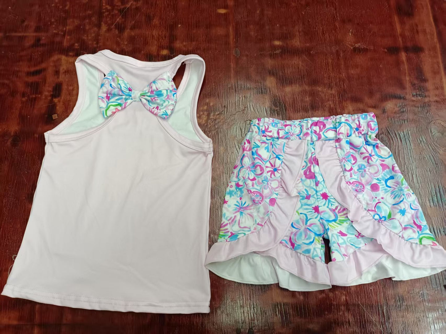 Preorder moq 5 Baby Girls Peach Sleeveless Floral Bow Top Ruffle Short Ser