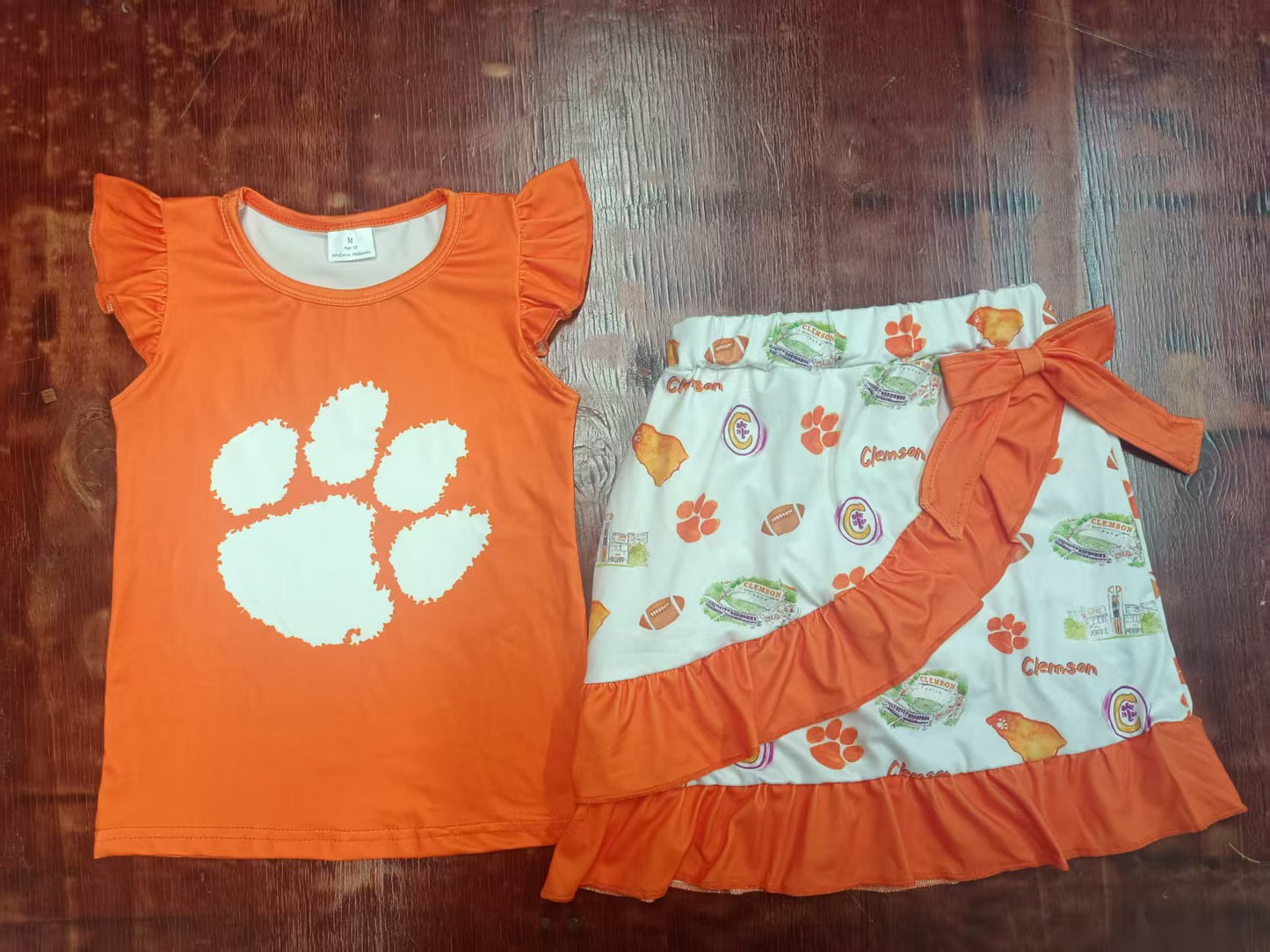 Preorder moq 5 Baby Girls Orange Flutter Sleeves Pawl Top Footballs Ruffle Skirts Set