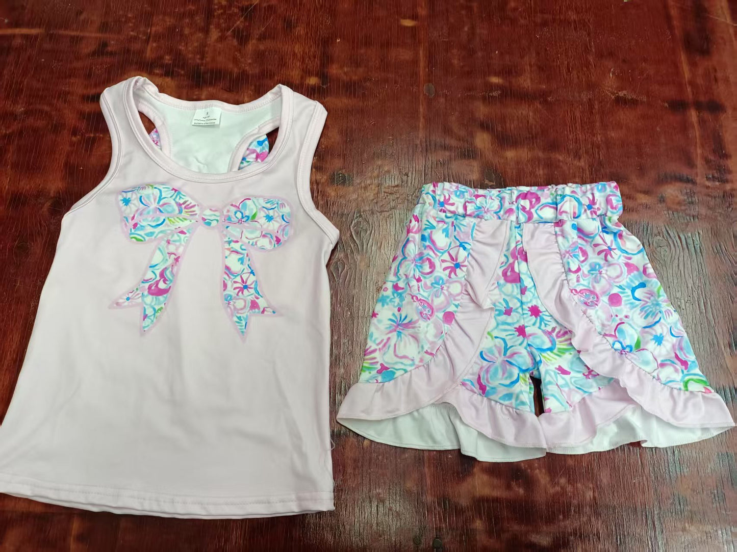 Preorder moq 5 Baby Girls Peach Sleeveless Floral Bow Top Ruffle Short Ser