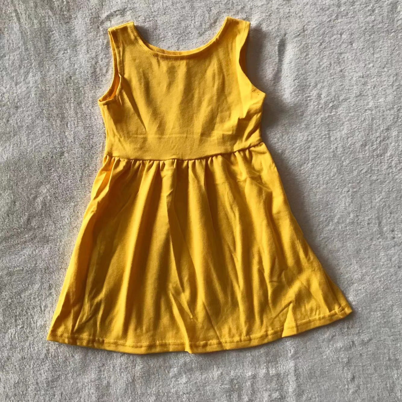 Baby girls mustard sleeveless dresses