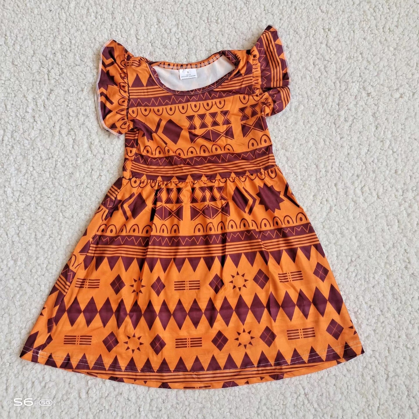 Baby girls orange aztec pearl dresses