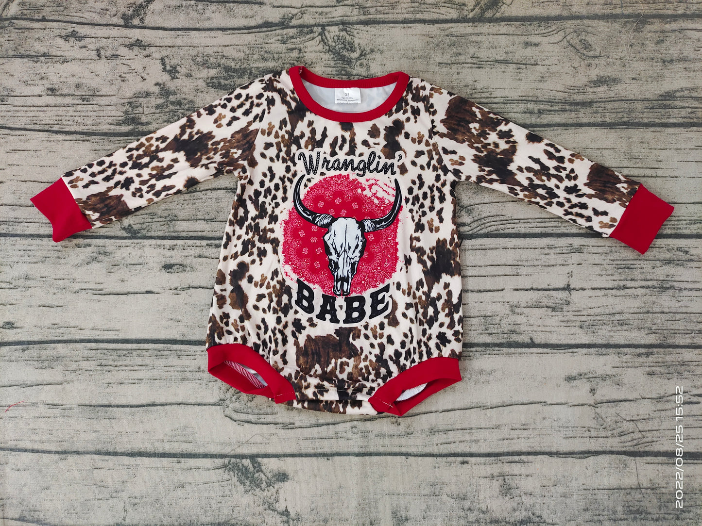 Baby girls cow print babe long sleeve rompers