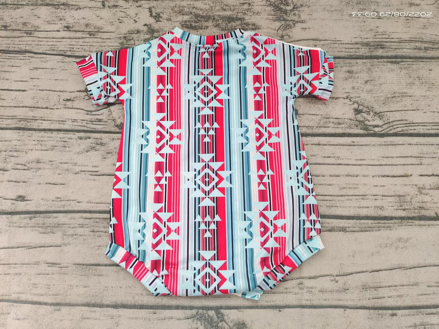 Baby girls cow aztec short sleeve rompers