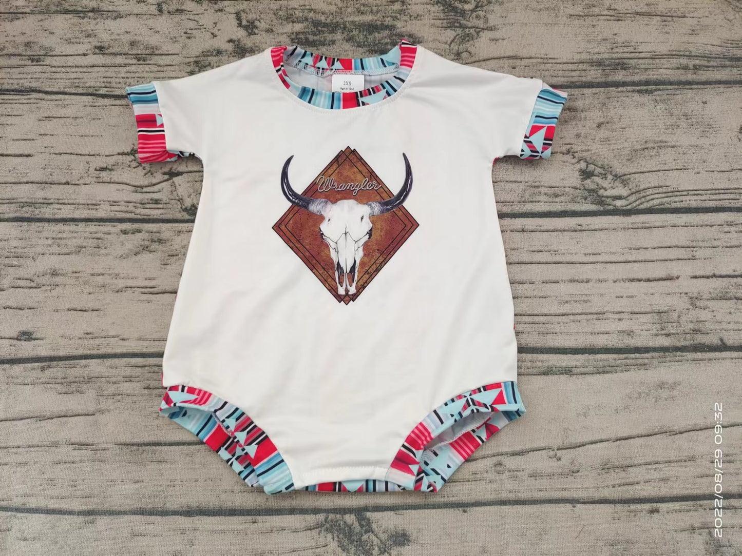 Baby girls cow aztec short sleeve rompers